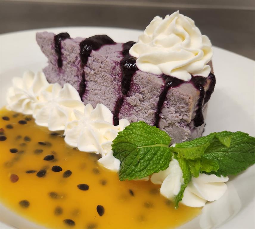 The Bushwakker Brewpub - Blueberry Passion Fruit Cheesecake