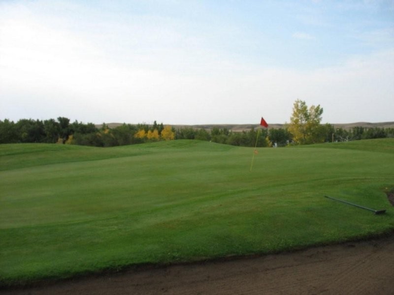 Irrigated nine hole grass greens golf course available for patrons with licensed clubhouse, putting green and driving range.