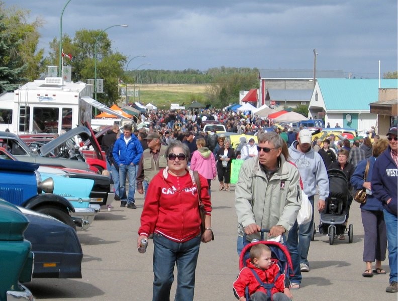 Crowd at St. Walburg Show & Shine - major attraction at the Wild Blueberry Festival
