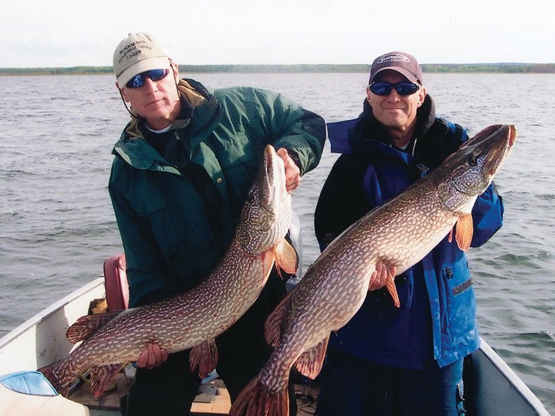 Athabasca Fishing Lodges - Double northern pike on Lake Athabasca. 